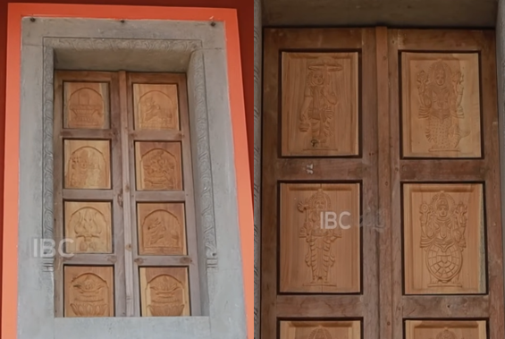 Carved wooden gateways at the Dhyan Lokam